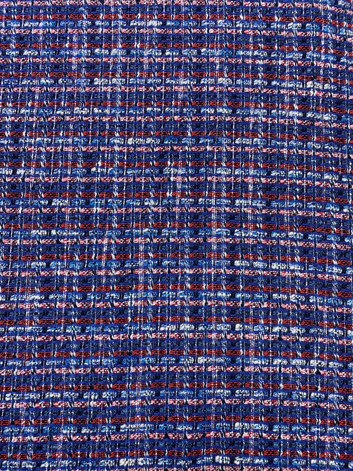 Boucle katoen blend blauw roze