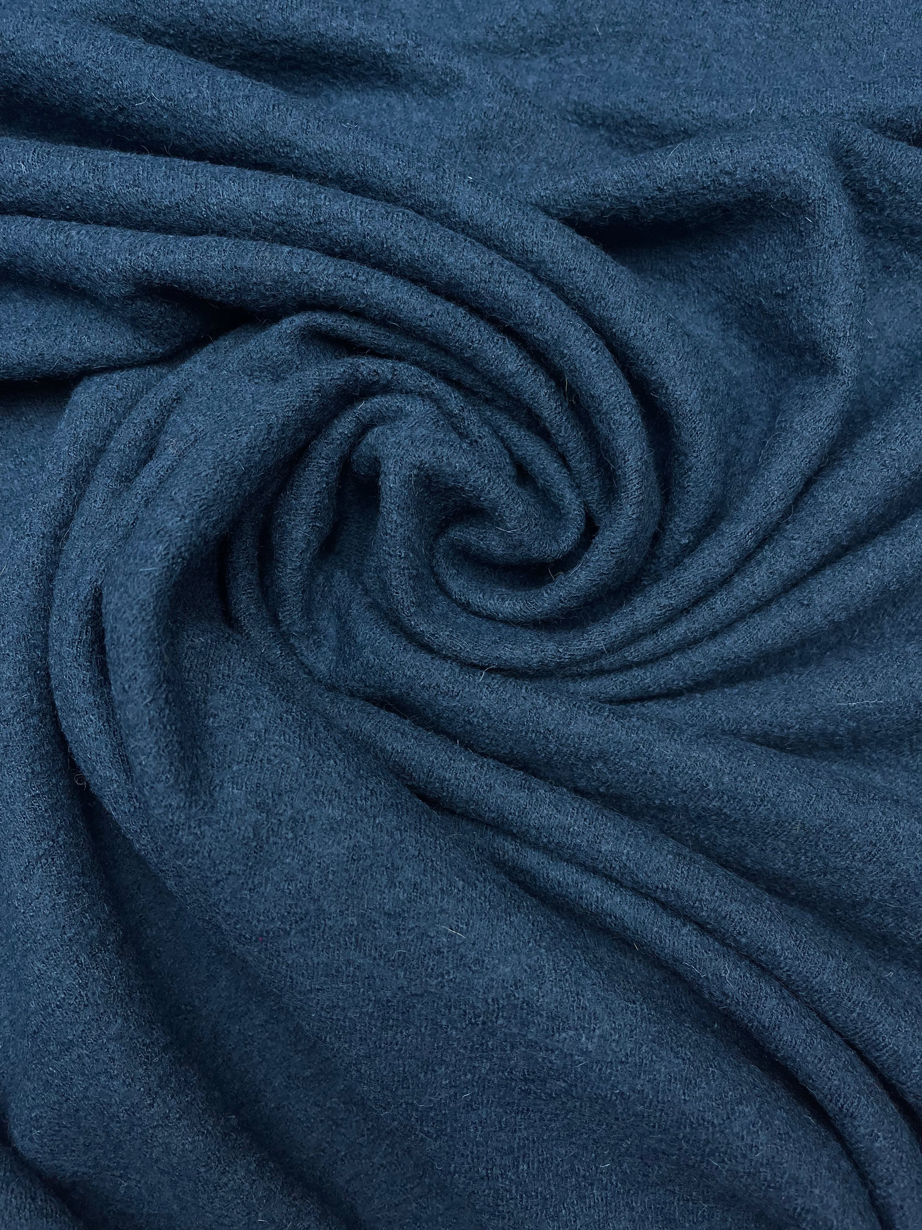 Gekookte wol / viscose donker petrol.