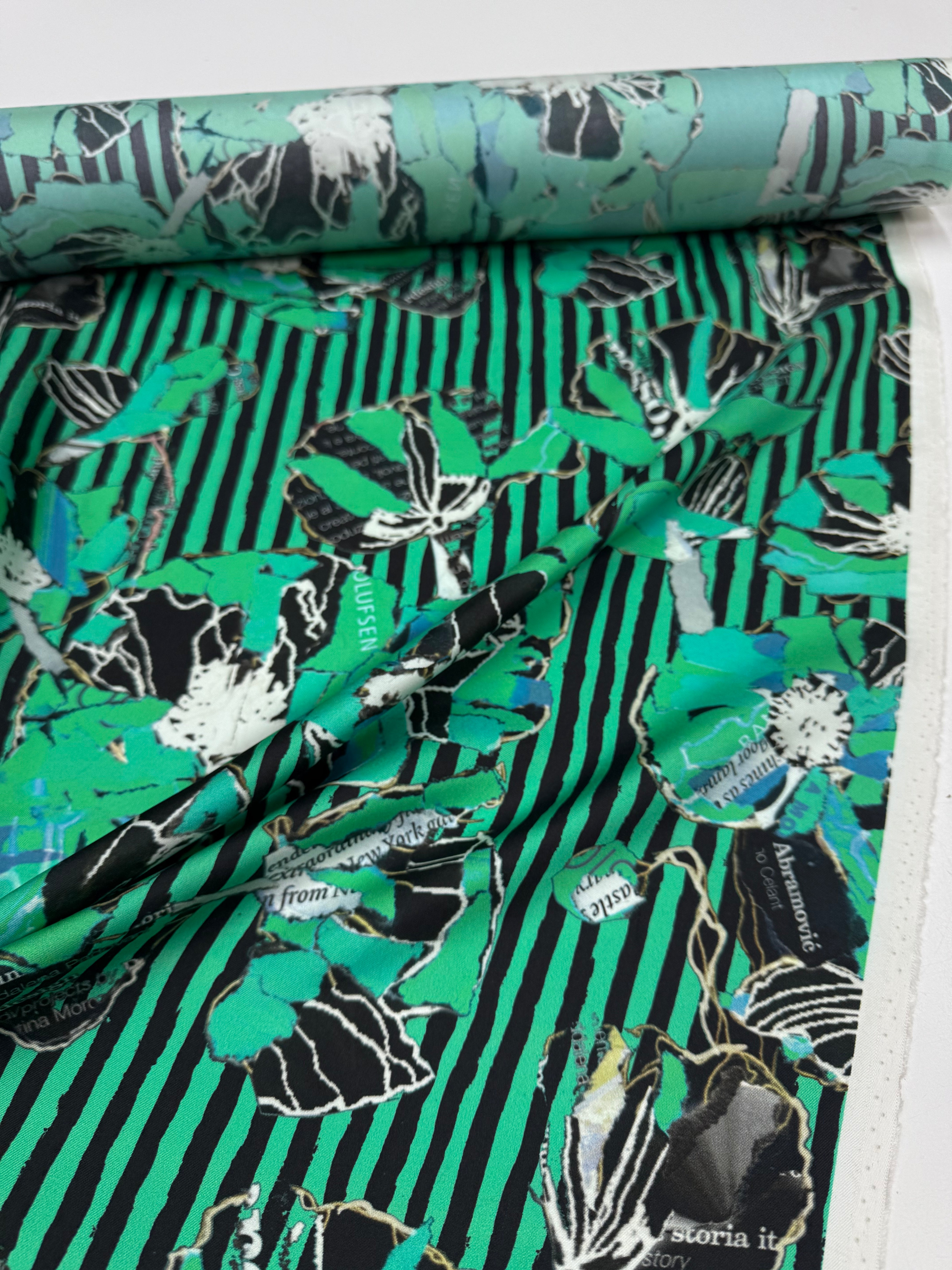 Silk twill with exclusive design collage green black flower