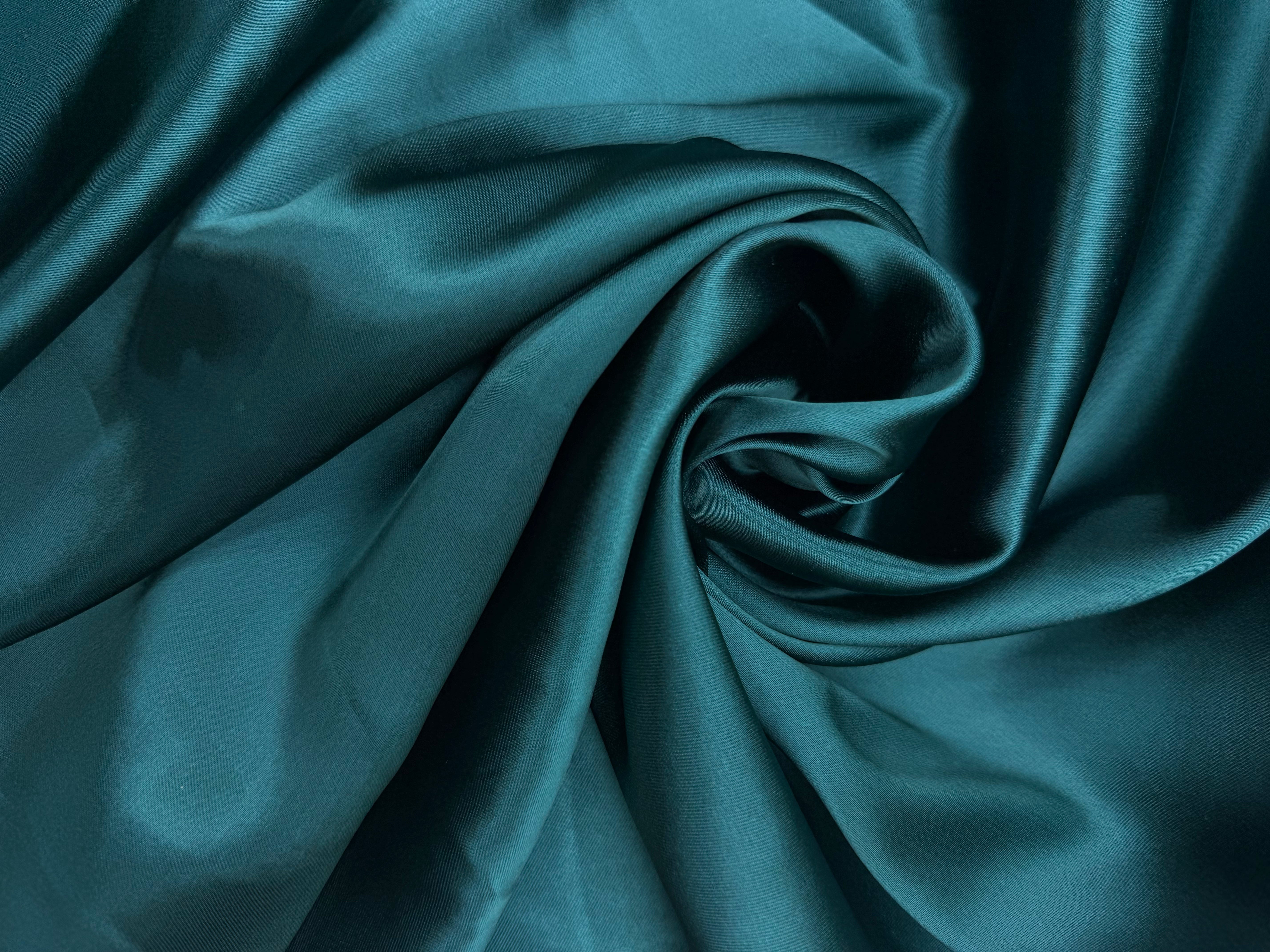 Viscose satijnbinding met stretch petrol