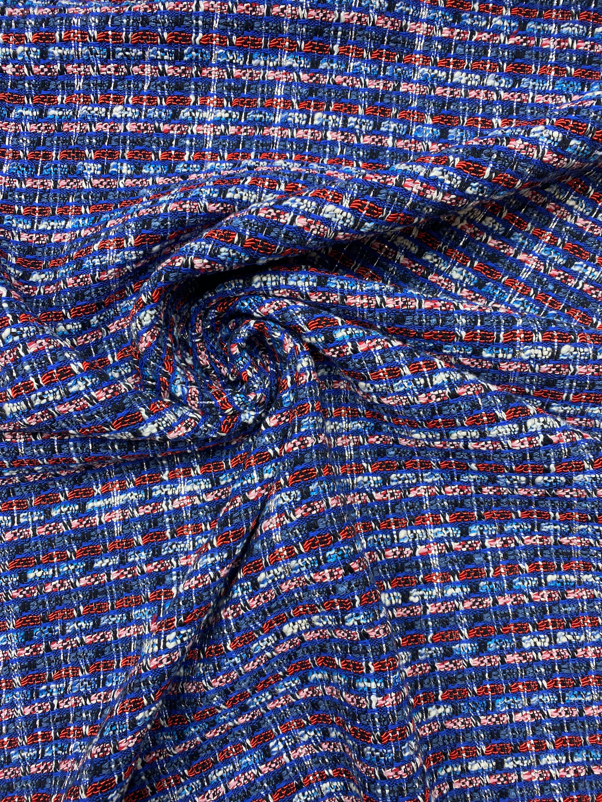 Boucle katoen blend blauw roze