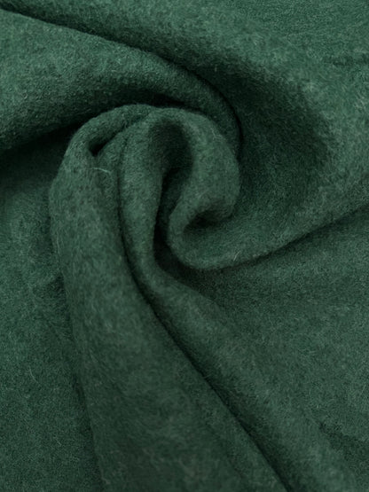 Gekookte wol groen