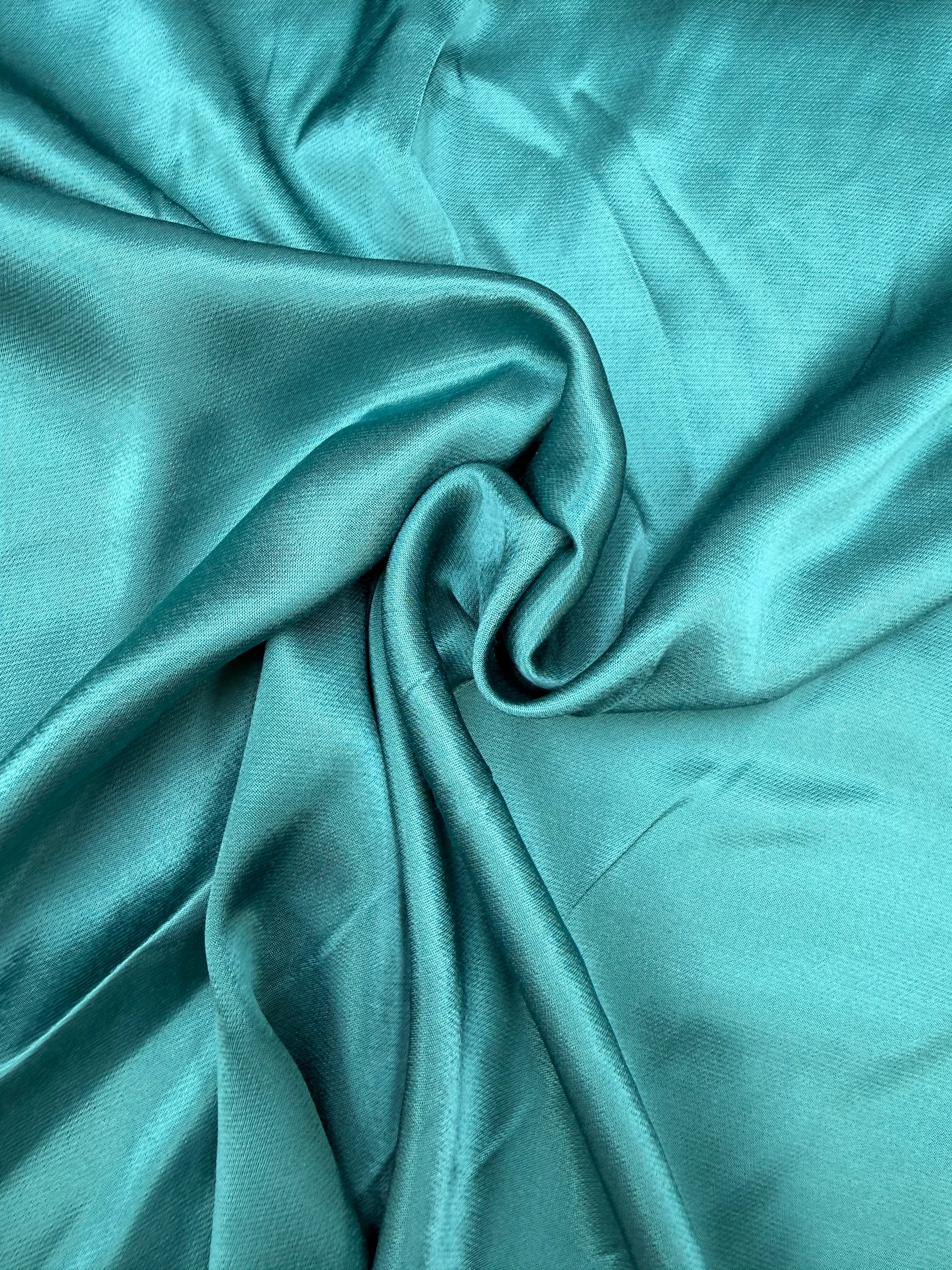 Viscose satijn binding ecovero zee blauw/groen