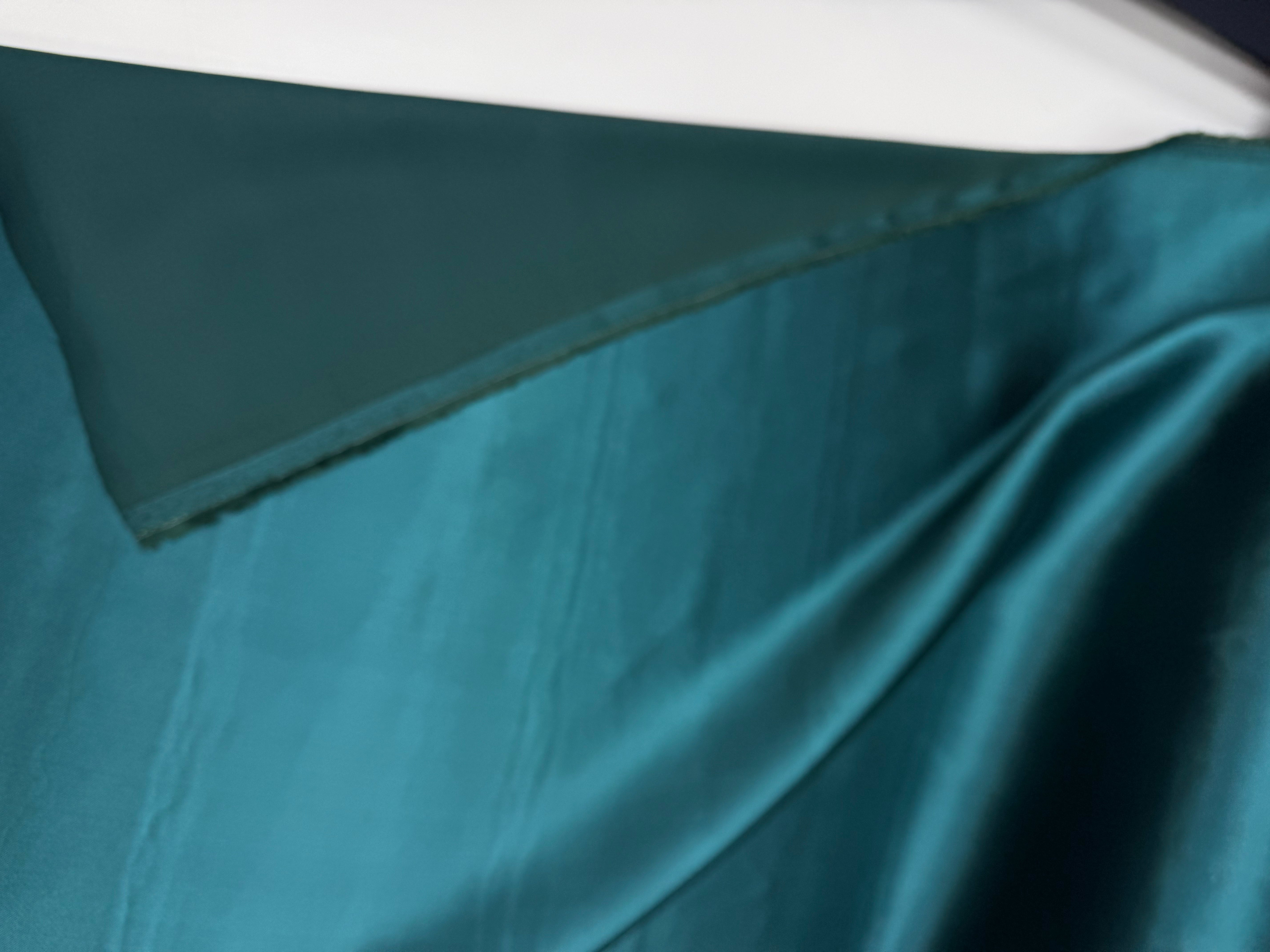 Viscose satijnbinding met stretch petrol