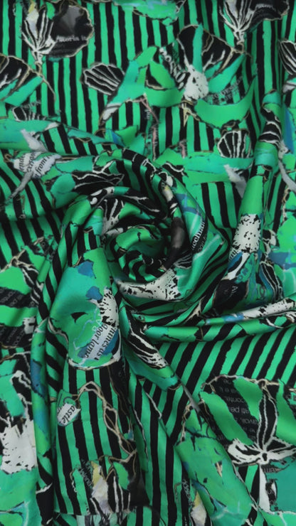 Zijden twill met exclusief dessin collage groen zwart bloem
