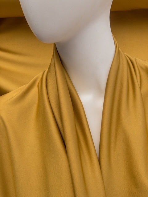 Zijden tricot goud geel